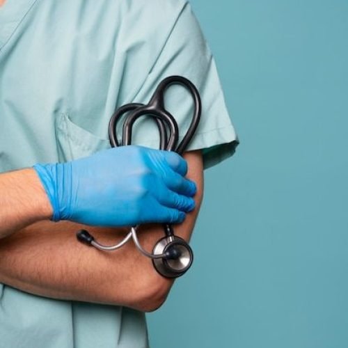 Front view doctor holding stethoscope _ Premium Photo
